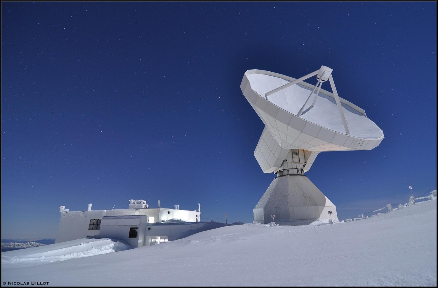 IRAM 30-meter telescope under the moonlight.